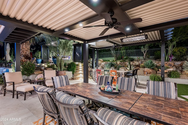 view of patio / terrace featuring ceiling fan