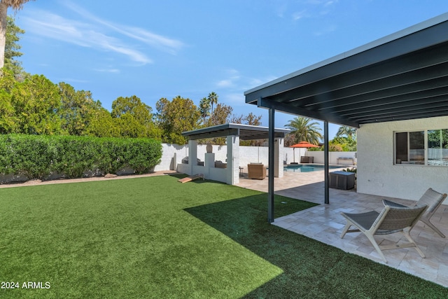 view of yard featuring a gazebo, a patio, and a fenced in pool