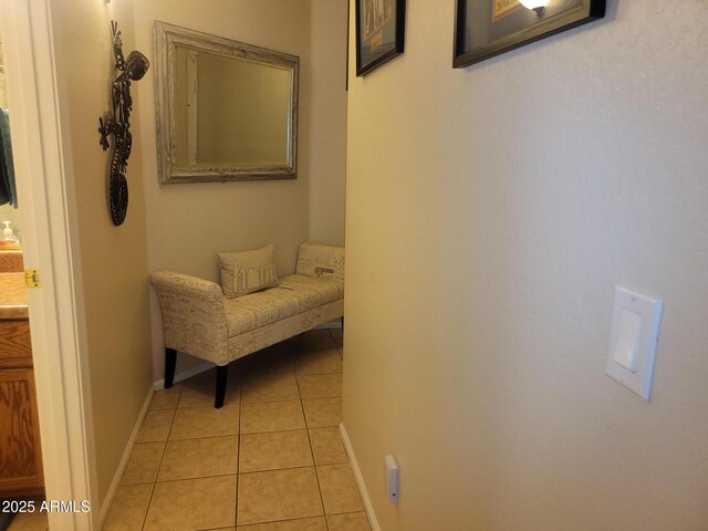 1769 E Jacob St, San Tan Valley, AZ 85140 - corridor featuring light tile patterned floors and baseboards