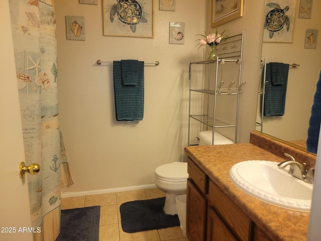 1769 E Jacob St, San Tan Valley, AZ 85140 - bathroom featuring tile patterned floors, toilet, vanity, and baseboards
