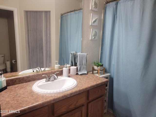 1769 E Jacob St, San Tan Valley, AZ 85140 - full bathroom featuring toilet and vanity
