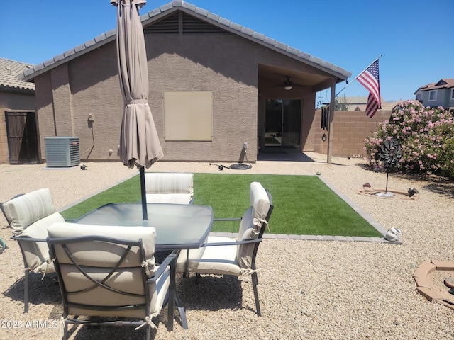 1769 E Jacob St, San Tan Valley, AZ 85140 - back of property featuring ceiling fan, a patio, fence, cooling unit, and stucco siding