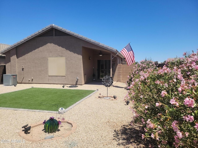 1769 E Jacob St, San Tan Valley, AZ 85140 - back of property with a ceiling fan, stucco siding, a patio, and cooling unit