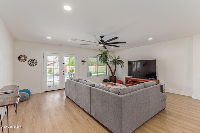 2033 E Janice Way, Phoenix, AZ 85022 - living room featuring light wood-type flooring, a ceiling fan, baseboards, recessed lighting, and french doors