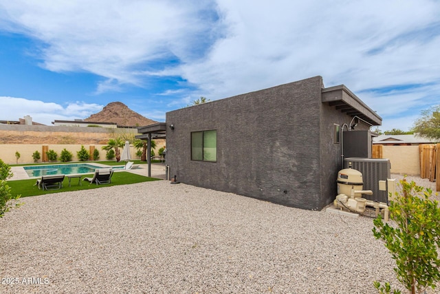 2033 E Janice Way, Phoenix, AZ 85022 - rear view of property with a fenced backyard, a patio, stucco siding, and cooling unit