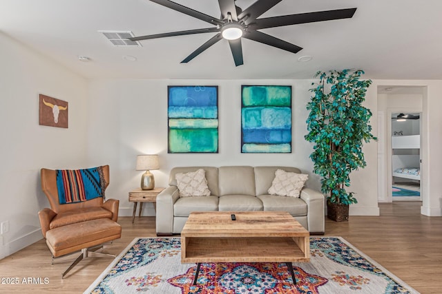 2033 E Janice Way, Phoenix, AZ 85022 - living room with a ceiling fan, baseboards, and wood finished floors