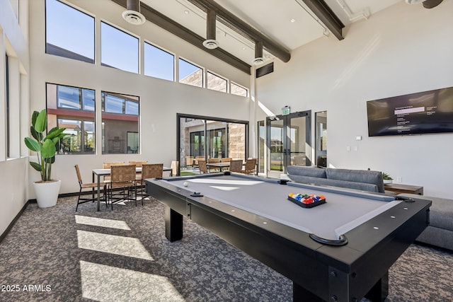 recreation room featuring beam ceiling, a towering ceiling, billiards, and carpet floors