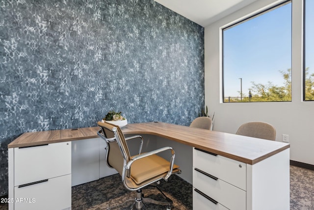 office area featuring wallpapered walls