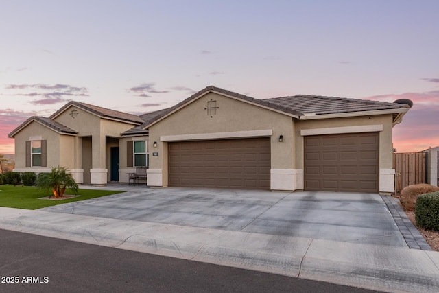 single story home featuring a garage