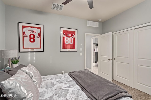 carpeted bedroom with a closet and ceiling fan