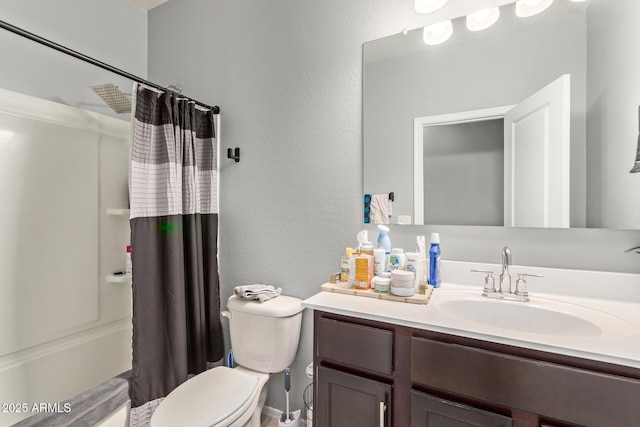 full bathroom with vanity, toilet, and shower / bath combo