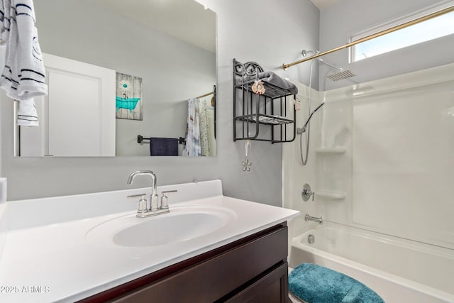 bathroom with vanity and shower / bath combo with shower curtain