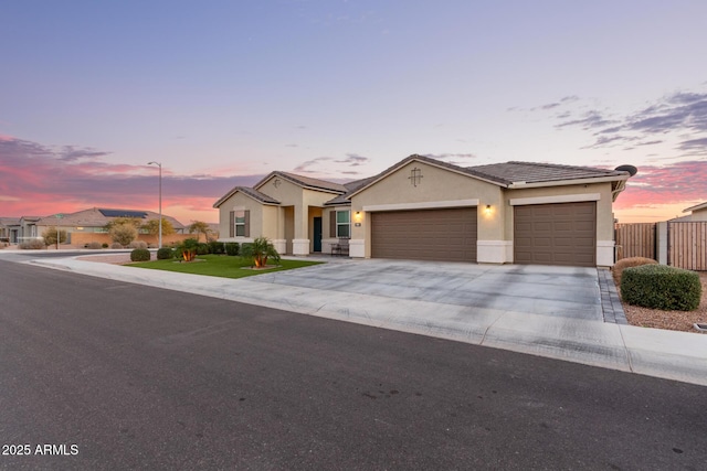 view of front of property with a garage