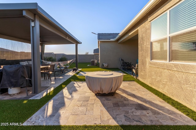 view of patio featuring area for grilling and central air condition unit