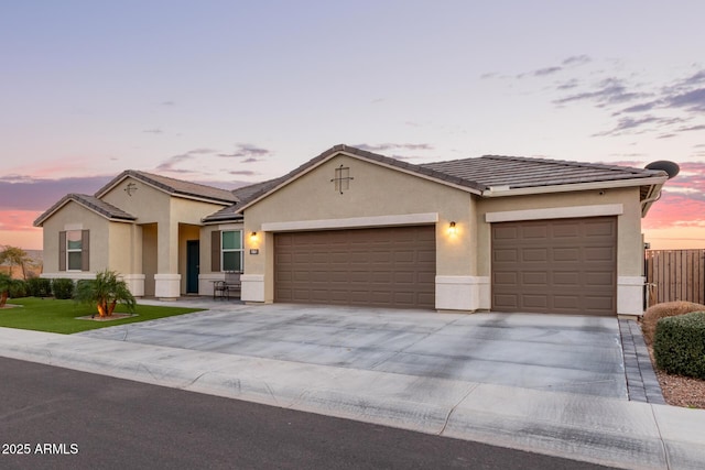 single story home featuring a garage