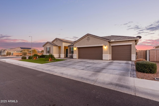 ranch-style home with a garage