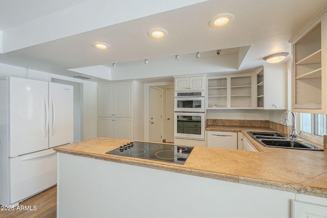 kitchen with visible vents, open shelves, a sink, recessed lighting, and white appliances