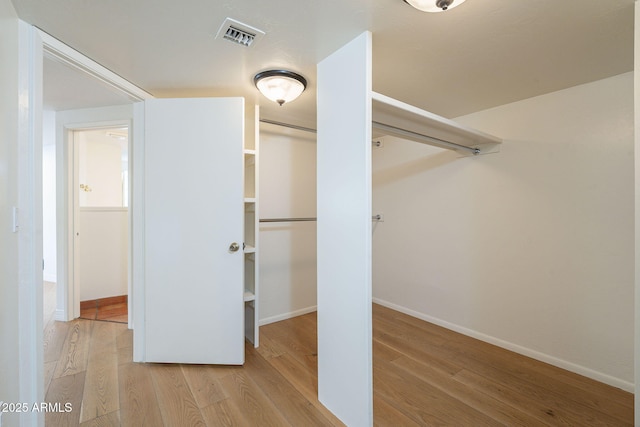 closet featuring visible vents