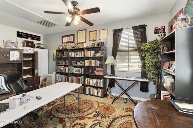 office space with ceiling fan and visible vents