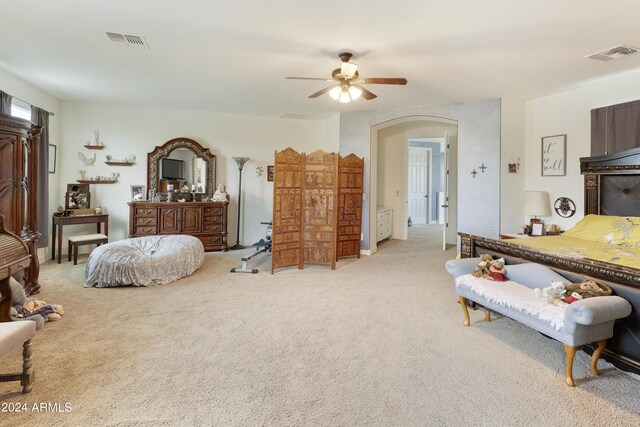 carpeted bedroom with ceiling fan