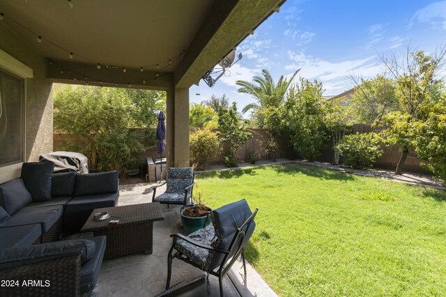 view of yard with a patio area and outdoor lounge area