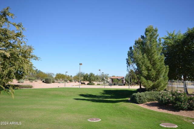 view of community featuring a yard and a playground