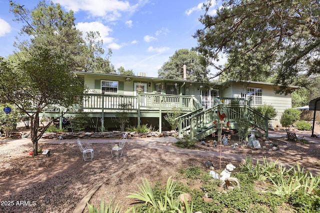 ranch-style house with a deck