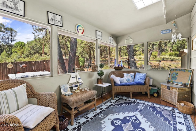 sunroom / solarium with vaulted ceiling