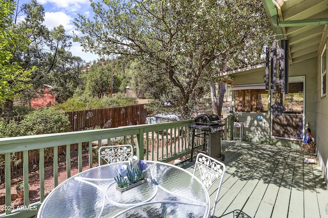 wooden deck with grilling area