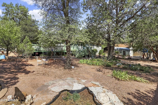 view of yard featuring a deck