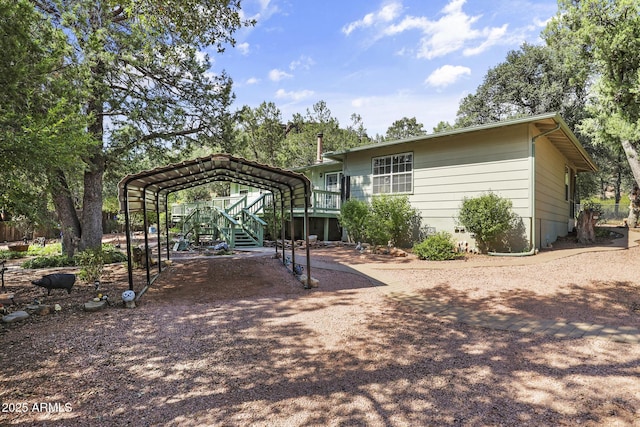 exterior space with a carport