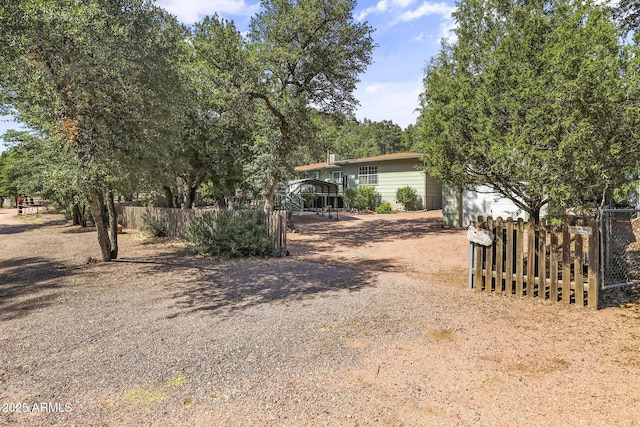 view of yard with a carport