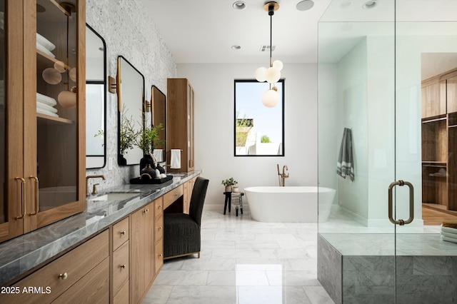 6584 E Gold Dust Ave, Paradise Valley, AZ 85253 - full bathroom featuring a freestanding bath, a stall shower, visible vents, marble finish floor, and vanity