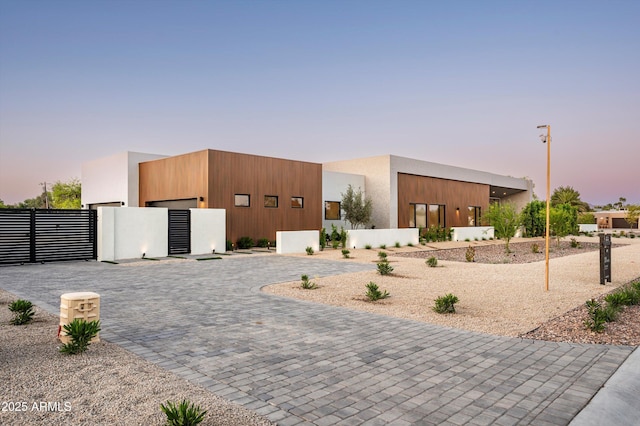 6584 E Gold Dust Ave, Paradise Valley, AZ 85253 - view of front of home with an attached garage and stucco siding