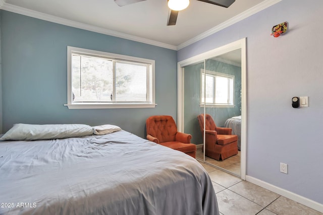 2823 W Banff Ln, Phoenix, AZ 85053 - bedroom with crown molding, a closet, light tile patterned floors, and ceiling fan