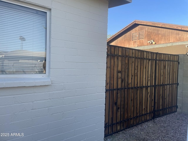 2823 W Banff Ln, Phoenix, AZ 85053 - exterior view of a gate and concrete block siding