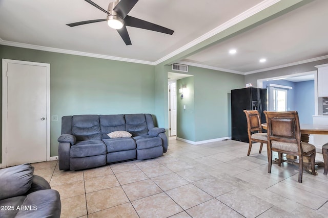 2823 W Banff Ln, Phoenix, AZ 85053 - living room featuring a ceiling fan, crown molding, light tile patterned floors, and recessed lighting