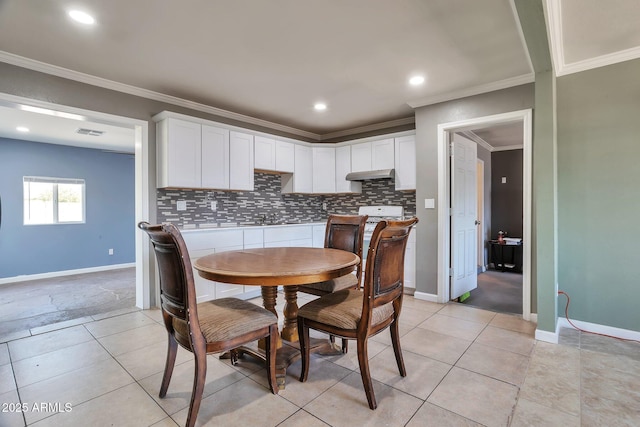 2823 W Banff Ln, Phoenix, AZ 85053 - dining area featuring ornamental molding, recessed lighting, and light tile patterned floors