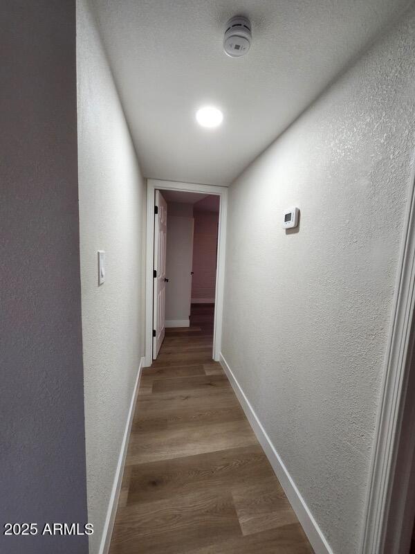 954 E Henry St, Tempe, AZ 85288 - hall with baseboards, a textured wall, and wood finished floors