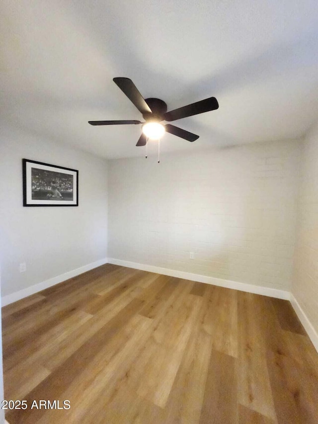 954 E Henry St, Tempe, AZ 85288 - spare room with a ceiling fan, baseboards, and wood finished floors