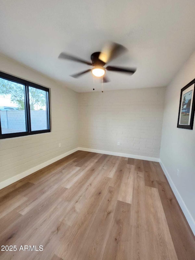 954 E Henry St, Tempe, AZ 85288 - spare room with baseboards, wood finished floors, and ceiling fan