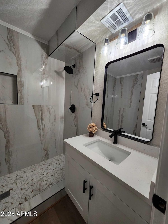 954 E Henry St, Tempe, AZ 85288 - bathroom featuring a marble finish shower, vanity, and wood finished floors