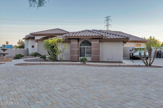 9183 W Shamel Ash Rd, Peoria, AZ 85383 - view of front of house featuring stucco siding and a tiled roof