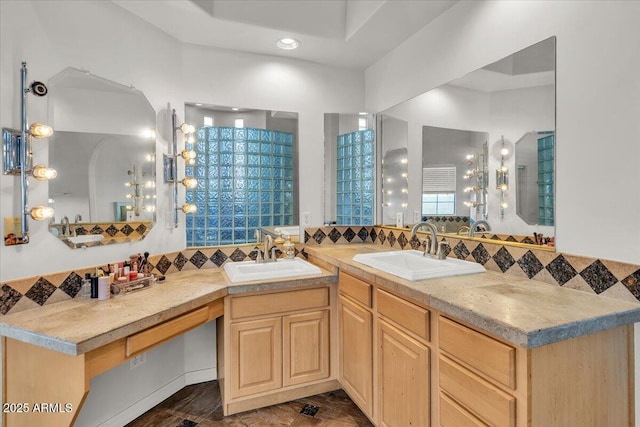 9183 W Shamel Ash Rd, Peoria, AZ 85383 - bathroom with double vanity and backsplash