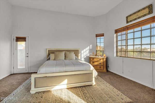 9183 W Shamel Ash Rd, Peoria, AZ 85383 - bedroom with carpet floors, multiple windows, and a towering ceiling