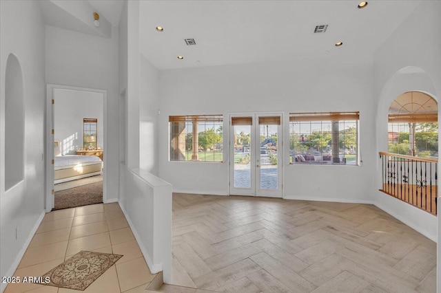 9183 W Shamel Ash Rd, Peoria, AZ 85383 - entryway with high vaulted ceiling, arched walkways, and recessed lighting
