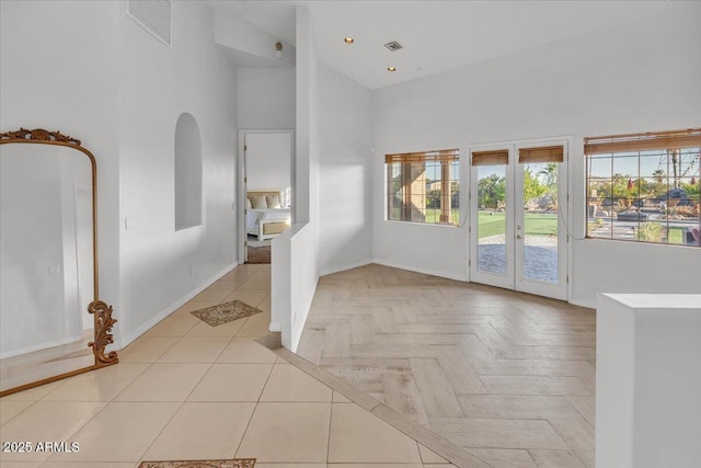 9183 W Shamel Ash Rd, Peoria, AZ 85383 - unfurnished room featuring high vaulted ceiling and arched walkways