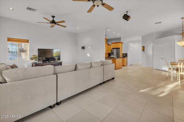 9183 W Shamel Ash Rd, Peoria, AZ 85383 - living room with a ceiling fan, light tile patterned floors, and recessed lighting