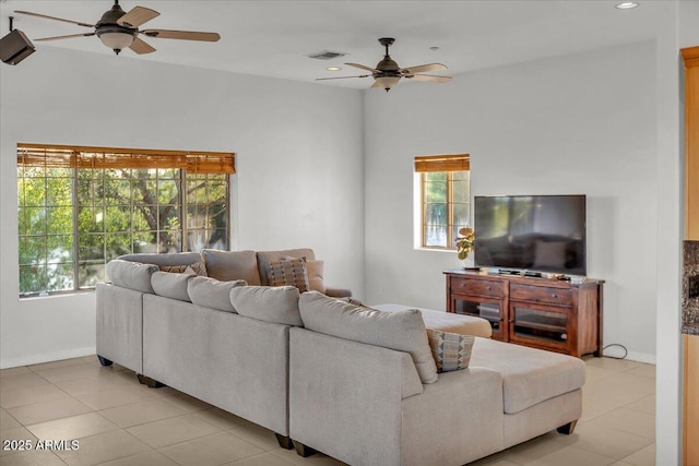 9183 W Shamel Ash Rd, Peoria, AZ 85383 - living area with a ceiling fan, light tile patterned floors, and recessed lighting