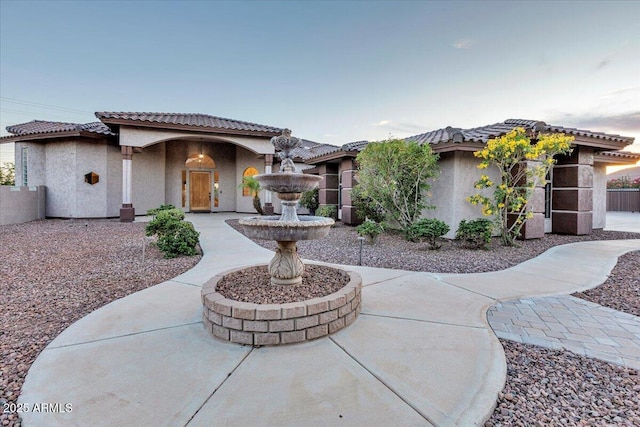 9183 W Shamel Ash Rd, Peoria, AZ 85383 - mediterranean / spanish-style house featuring stucco siding and a tiled roof